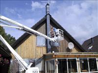 Under tiden laserade Kjelle s�derv�ggen